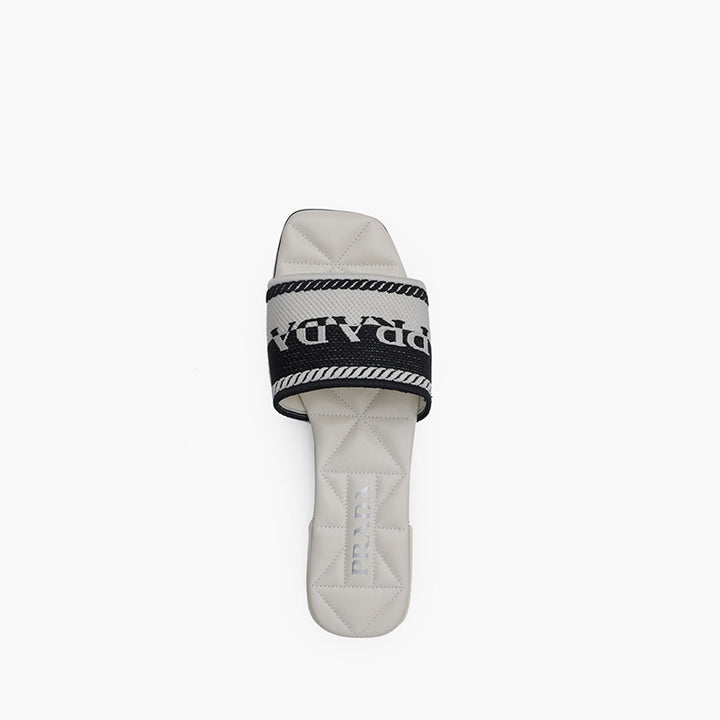 PRADA Women Embroidered Lettering Logo Slides in Black-Chalk White with Quilted Sole - Lovelo Room